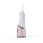 PA05 cordless water flosser in white and pink with transparent reservoir