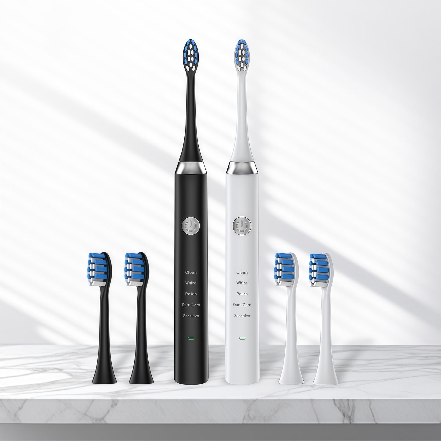 Two Sonic Electric Toothbrush 36,000 VPM | PA5618 in black and white with extra brush heads on marble surface.