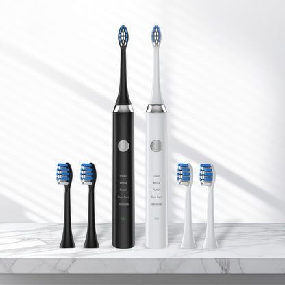 Two Sonic Electric Toothbrush 36,000 VPM | PA5618 in black and white with extra brush heads on marble surface.