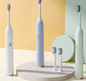 White S1 sonic electric toothbrush upright with oval brush head and front display