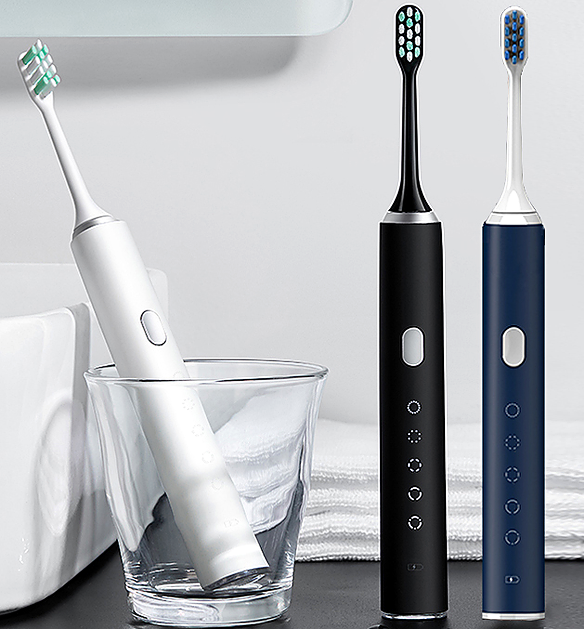 T809 sonic electric toothbrush in white, black and dark blue with oval brush heads