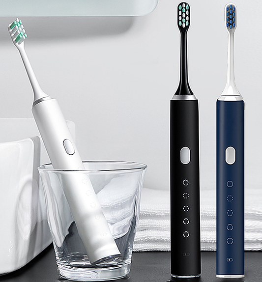 T809 sonic electric toothbrush in white, black and dark blue with oval brush heads