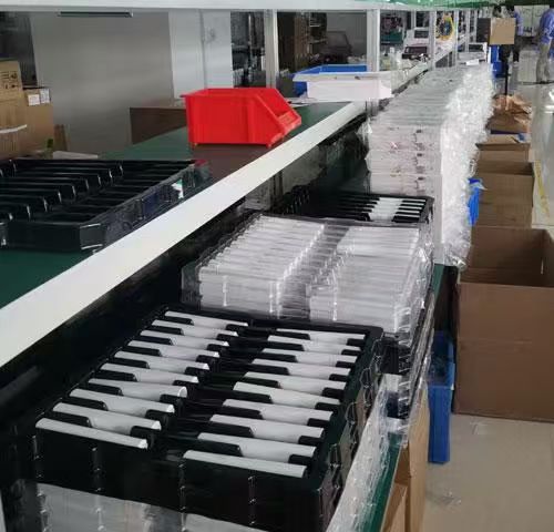 Electric toothbrush assembly line and packaging at OQPO manufacturing facility
